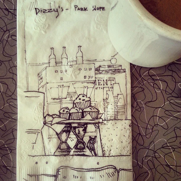 Lunchtime napkin doodle of an awesome display of muffins.