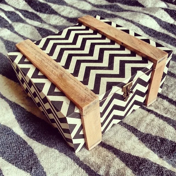 I took apart this awesome cigar box,sanded it to within an inch of its life and fancied it up with rice paper.