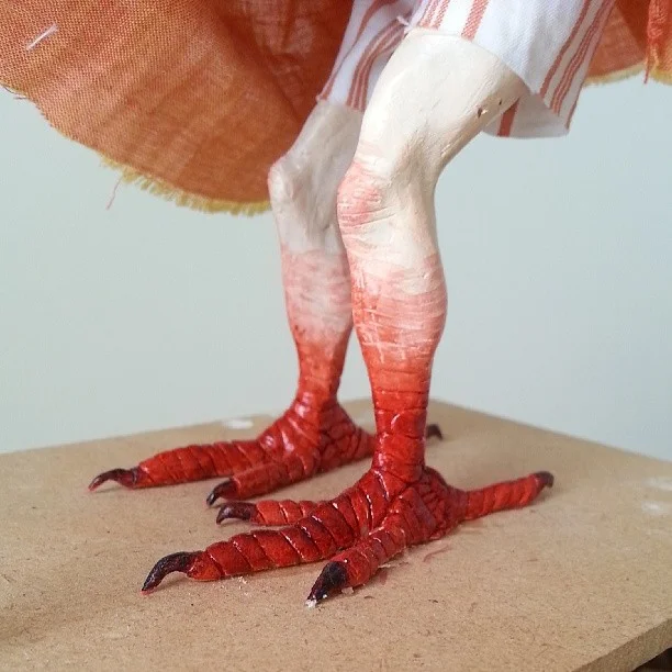 A view of her chicken legs (heh) and underoos.