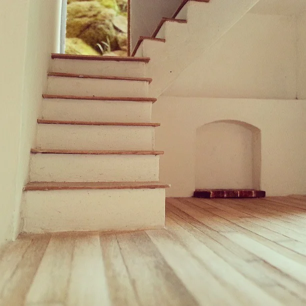 I combined two unfinished models to take reference photos. Everything in this picture is made from coffee stirrers, basswood, paper, wool and spackle… sooo much spackle.