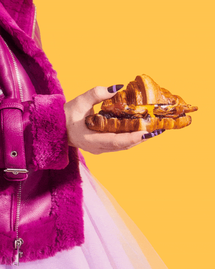 credits: photo- jenna gang, food styling- jen beauchesne, clothing- ross mcCallum, nail design- Ada Yeung, nail tech- michelle sun. description: conceptual animation of model holding an egg croissant.