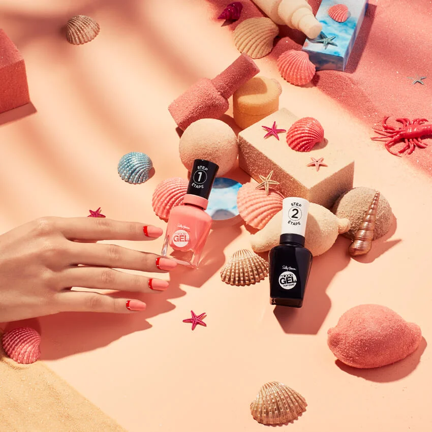 client: sally hansen credits: photo- jenna gang, styling- marie-yan morvan, art direction- edward yeung description: conceptual beauty photo of woman grabbing for a Sally Hansen nail polish.