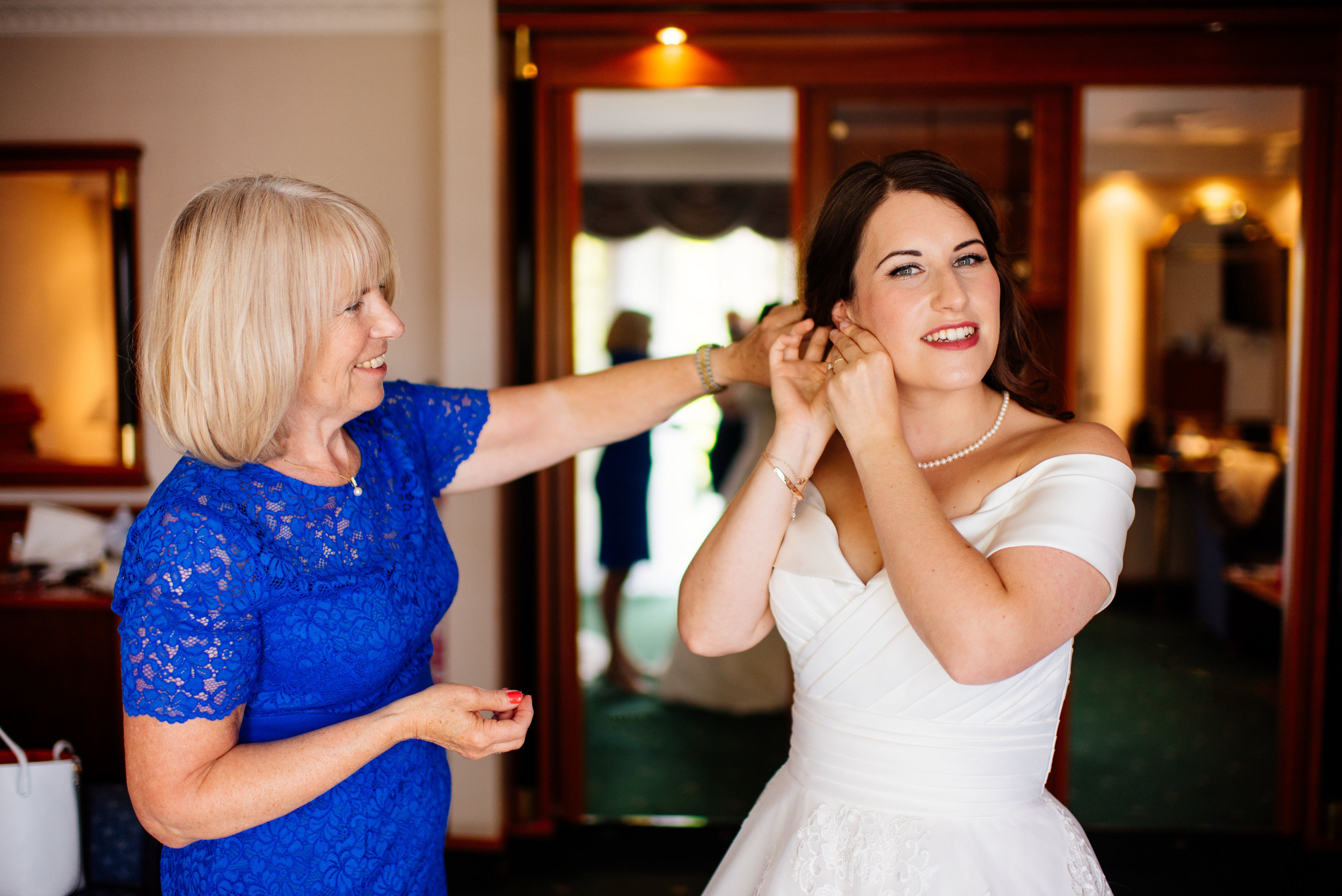 12 Lillibrooke Manor Berkshire Mother Helping Bride Wedding Photography.jpg