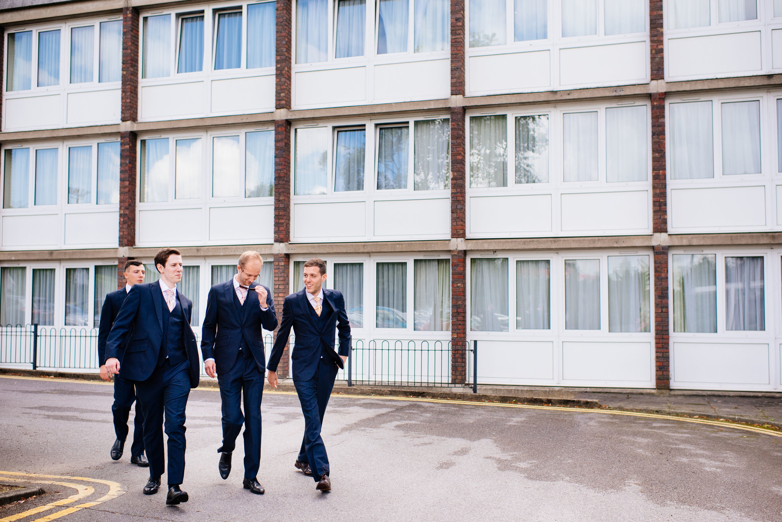 17 Lillibrooke Manor Berkshire Groomsment Walking Wedding Photography.jpg