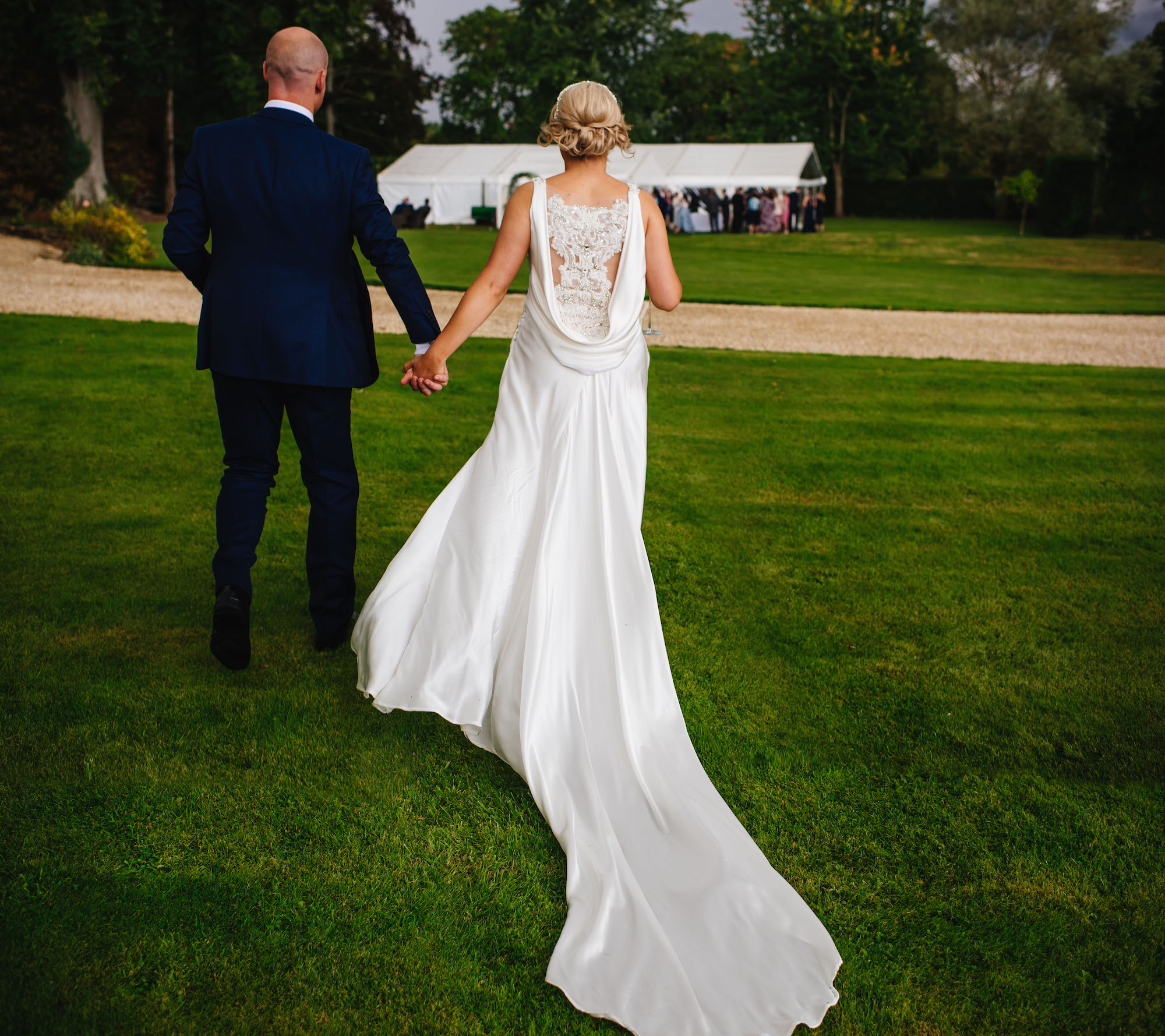 09_Rushall_manor_wiltshire_wedding_photography_bride_groom_backless_silk_dress.jpg