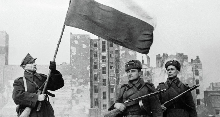 A Polish soldier raises the flag after Russian soldiers enter Warsaw. There is criticism of the Red Army for sitting outside Warsaw for 2 months rather than entering the city and preventing widespread destruction and bloodshed. However Genia and her girls wept with joy when the Russian soldiers arrived. 