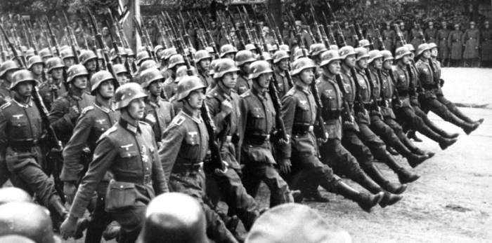 German soldiers march in Warsaw, 1939. The Germany army trialled its 'Blitzkrieg', or 'lightning war' of mechanised land sea and air assaults in Poland. They overran the entire country within days. 