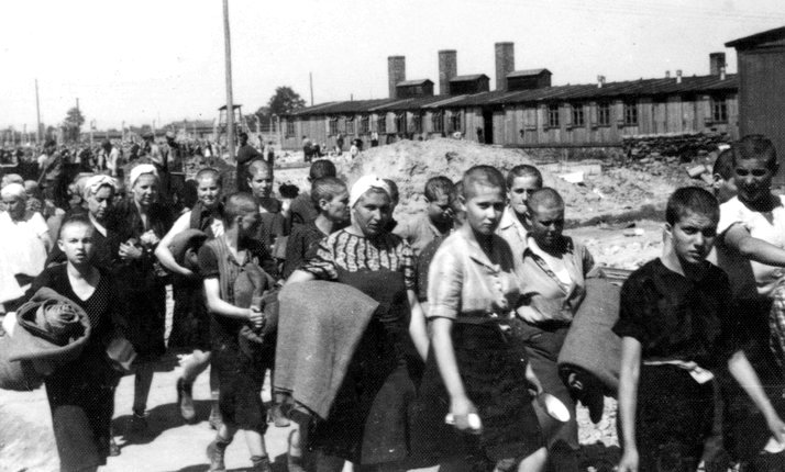 Jewish women from Carpathia, a region between Hungary and Ukraine, walking to the barracks at Auschwitz, May 1944. They were part of the mass expulsion of rural Jewish communities which followed Germany's invasion of Hungary in March 1944.