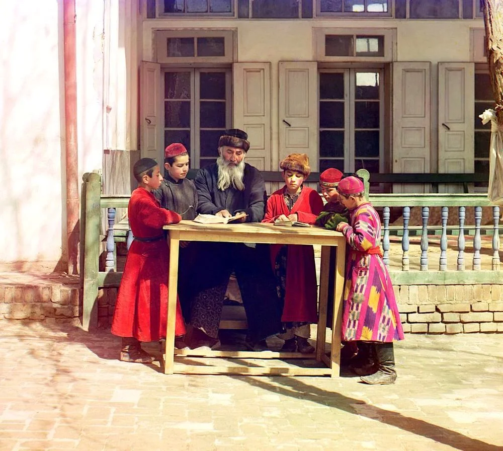 Jewish boys studying with their teacher, Samarkand, 1910. Photo by Sergei Prokudin-Gorskii, who travelled across Russia shooting in colour in the early 20th century. At that time, it was a complex process, involving photographing 3 different coloure…