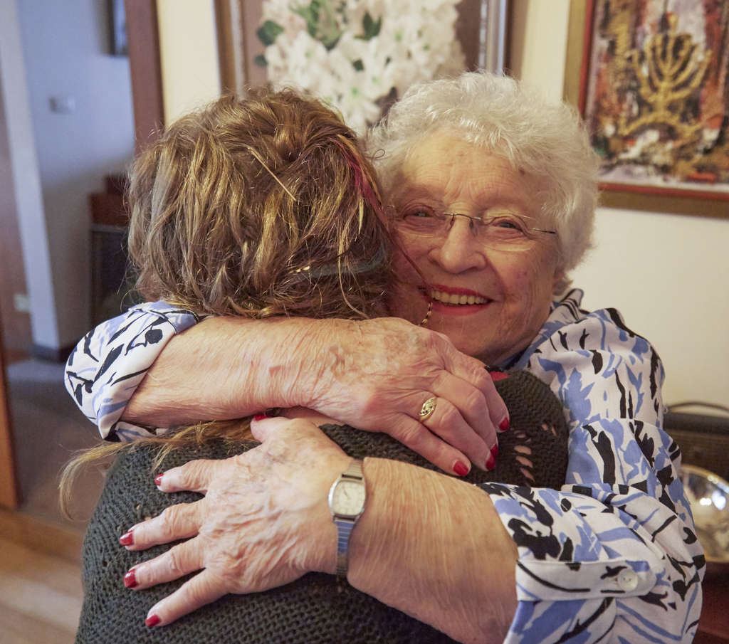 Saba Feniger and her eldest grand-daughter, Keren Dobia. Hugging always improves baking results...
