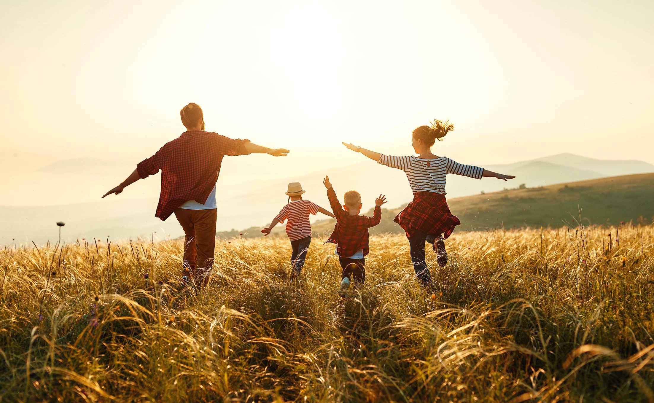 Family enjoying life outside and not worrying about IRS or taxes