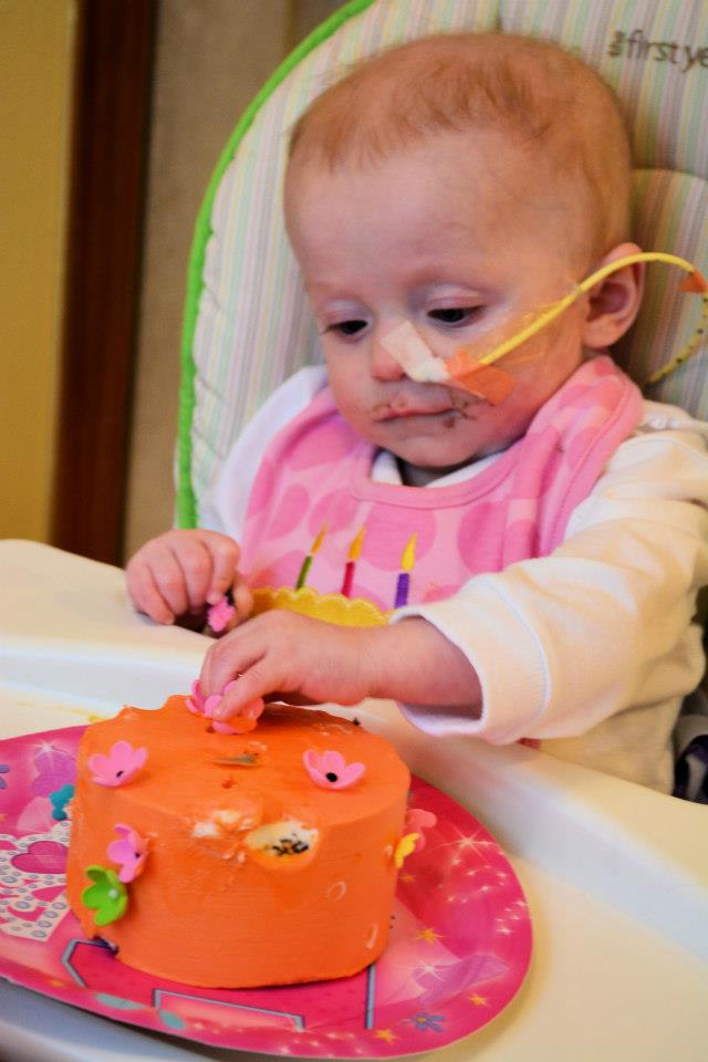  Enjoying her own personal cake!