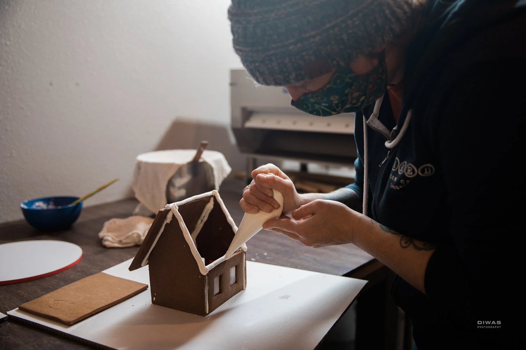 Attach the roof and make sure to add icing top to secure the roof.