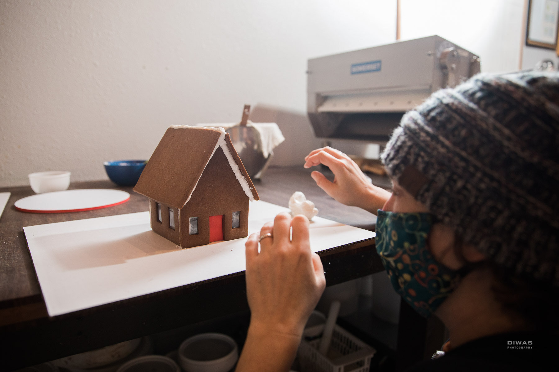 Prop something under each side of the roof to dry so it doesn't slide.