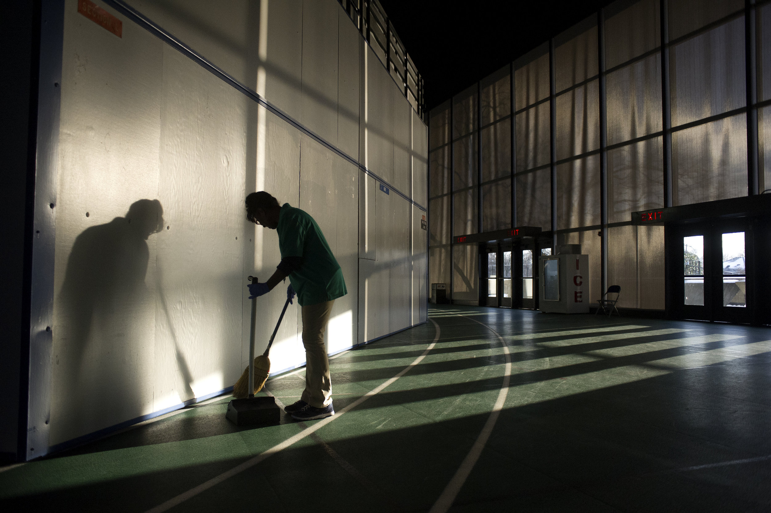  Jan Williams of Murfreesboro sweeps the floors of the Murphy Center in Murfreesboro Thursday, Mar. 5, 2015.  