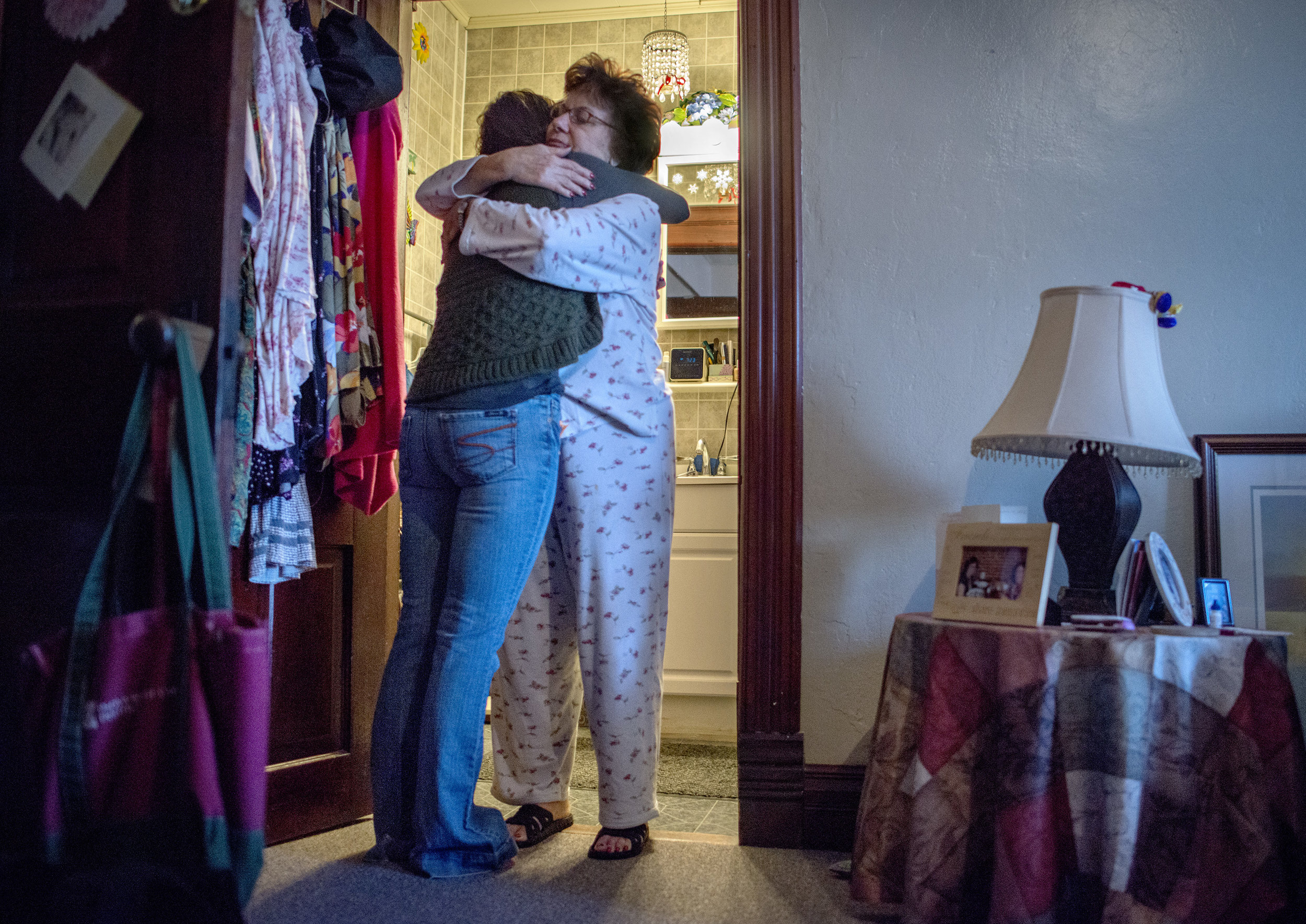Gayle comforts Kellie before she goes to see her husband at Menard Correctional Center.