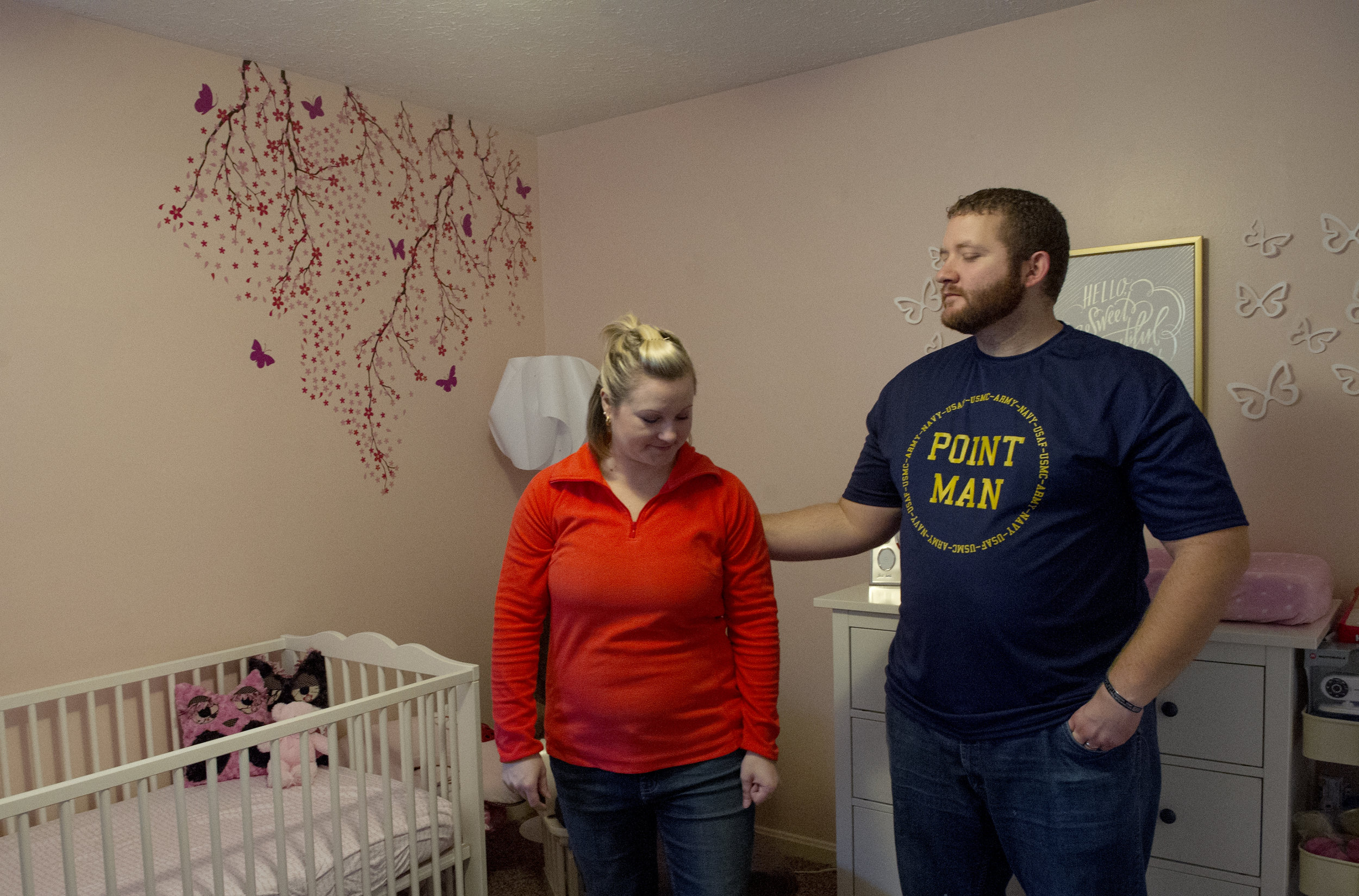  Erickia and Michael put the finishing touches on Gracelyn's room during the final weeks of Angelica's pregnancy at their home in Evansville Sunday Nov. 9, 2014. "Everyone we know knew for the longest time we were trying to have a child," Michael des