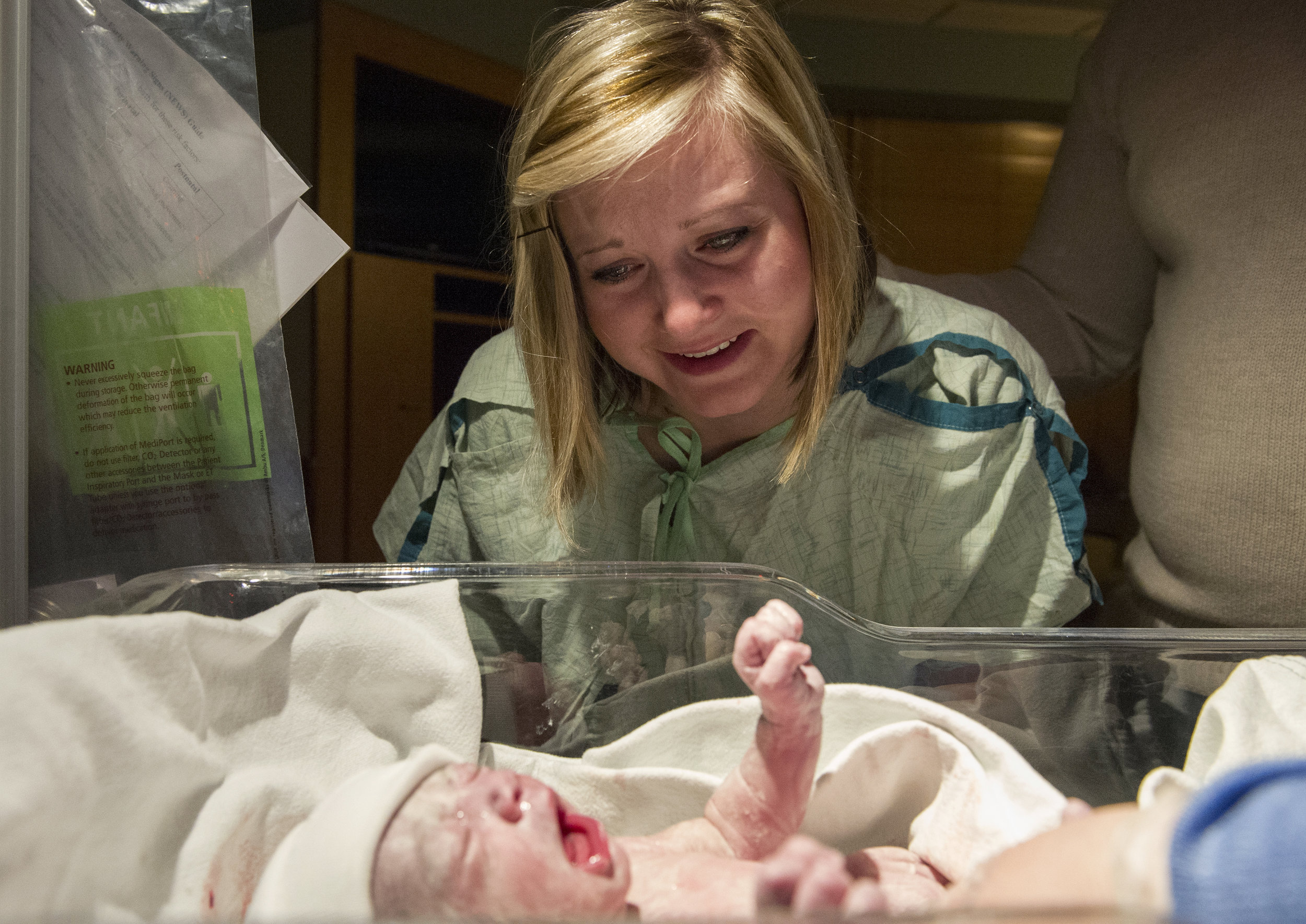  Erickia lays eyes on Gracelyn for the first time minutes after she is born and removed from the delivery room at St. Mary's Medical Center in Evansville Monday Dec. 1, 2014. "Before Gracelyn I lived in this state of constant heartache," Erickia said