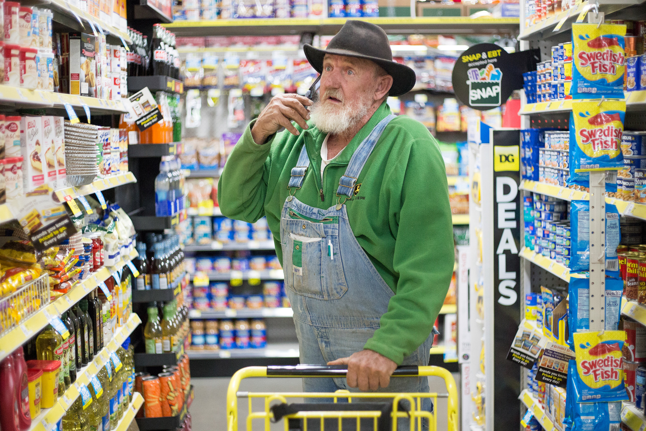  George Beaty of Evensville, Tenn. scans the aisles for cream of chicken soup for his neighbor at Dollar General in Evensville, Tenn. Thursday, Nov. 16 2017. Beaty, a retired welder and plumber, said he usually stops by the store several times a week