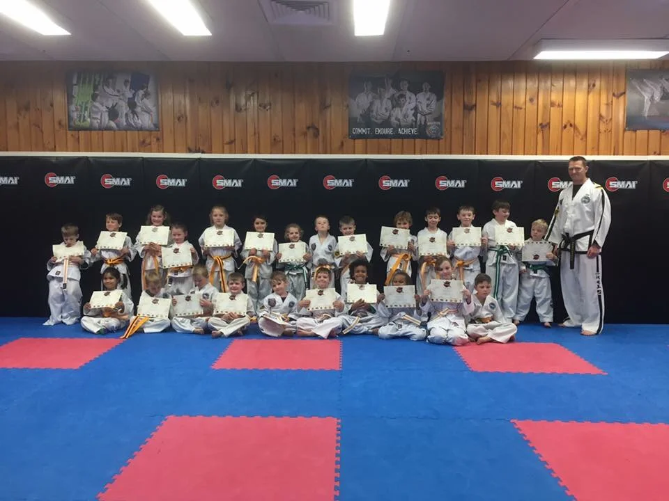 Our Little Ninjas are all smiles after their grading. Well done team!