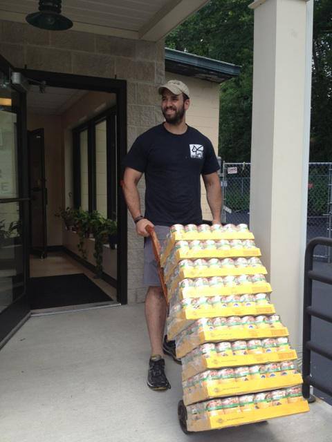 Daniel Reitman with Donations for Town of North Hempstead Animal Shelter.jpg