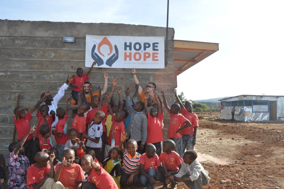 Daniel Reitman and Chipeng Liang with Children at Little Drops Children's Home in Kenya.jpg
