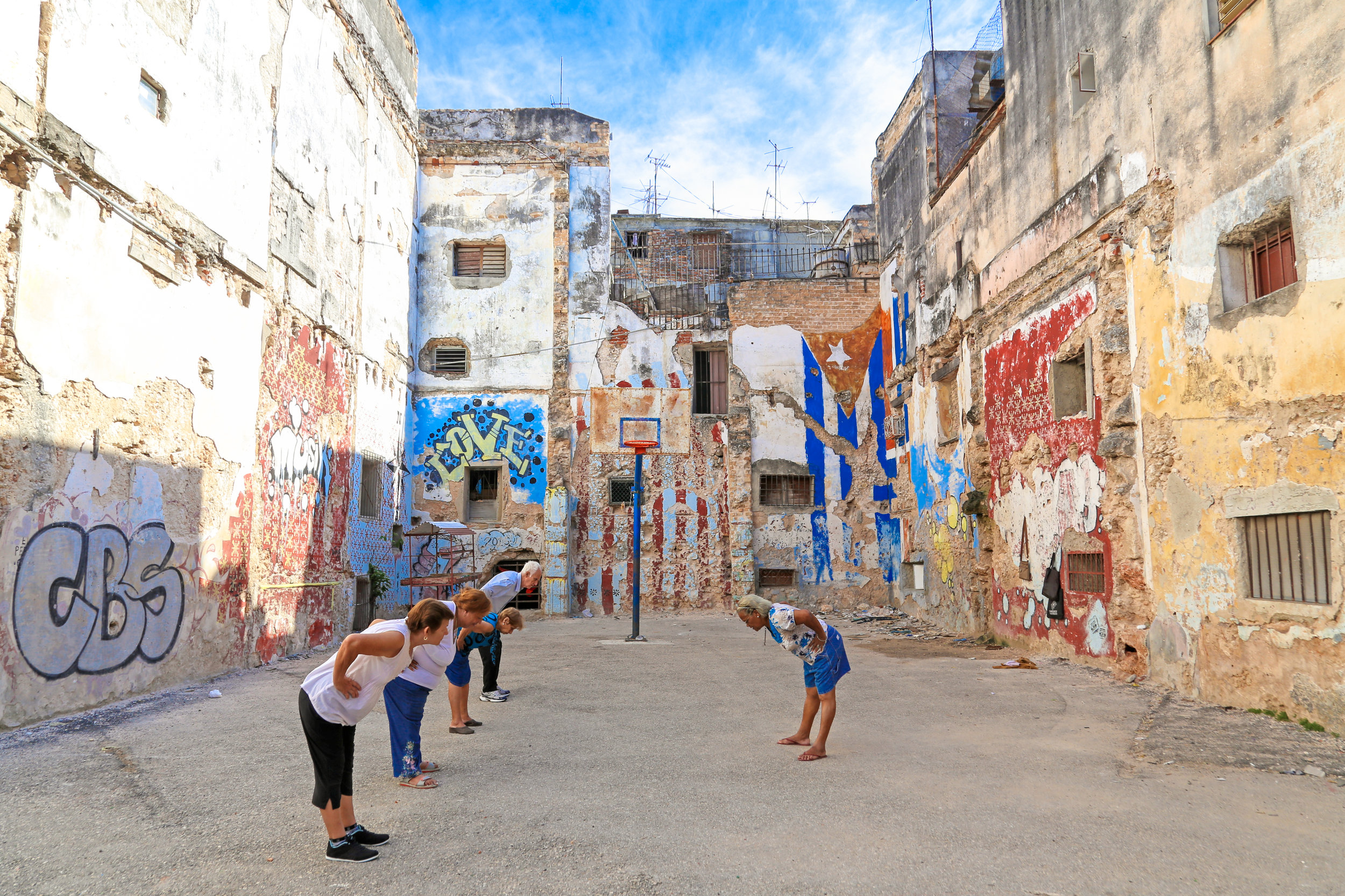 "The grandparents of today”, a community project in which senior citizens get together on Tuesdays, Wednesdays and Fridays in the neighborhood of Colon, Centro Havana to exercise and play games to refresh their memory mixed with dancing is pictured on May 13th, 2016 during their warm-ups. Pictured above are Guillermina, age 83, Ana, age 71, Leonor, age 77, Orlando, age 77 and Milagros , age 70.