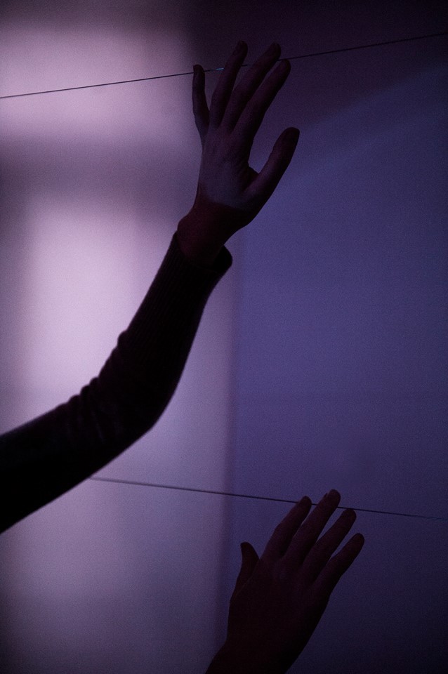  Detail of installation room 1. Hands on piano strings, light diffusion paper.&nbsp;  Photo by Stéphane Charpentier. 
