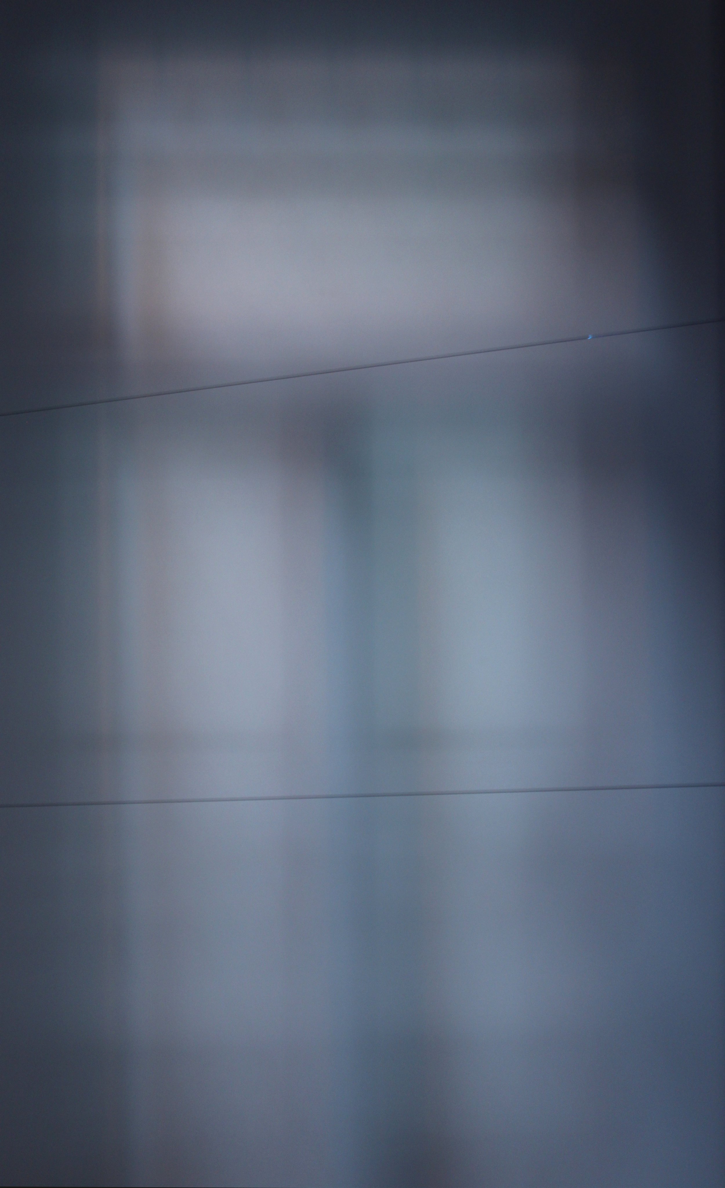 Detail of installation room 1. Piano strings across light diffusion paper. Afternoon light.