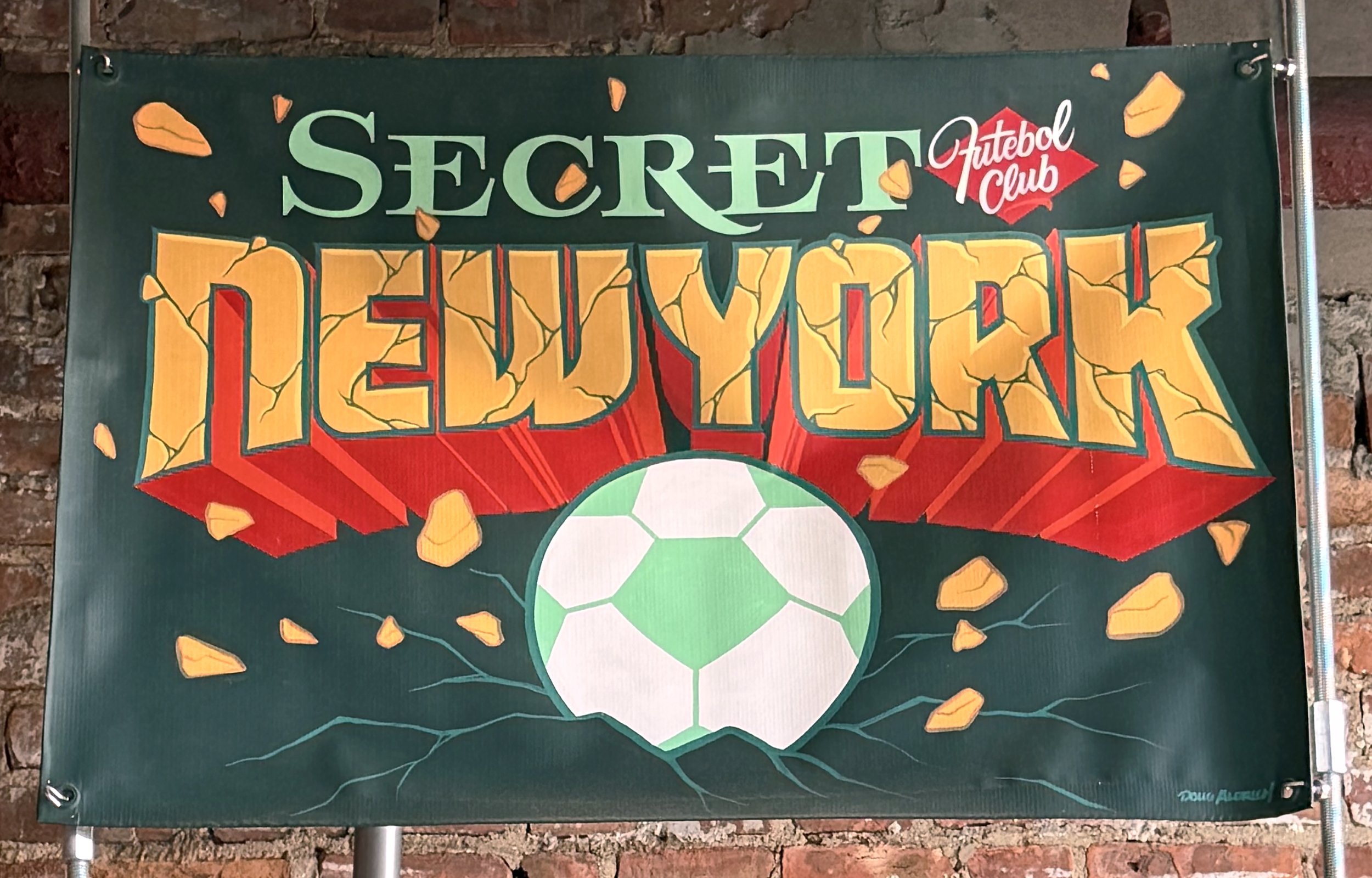Hand painted banner sign for Secret Futebol Club in New York