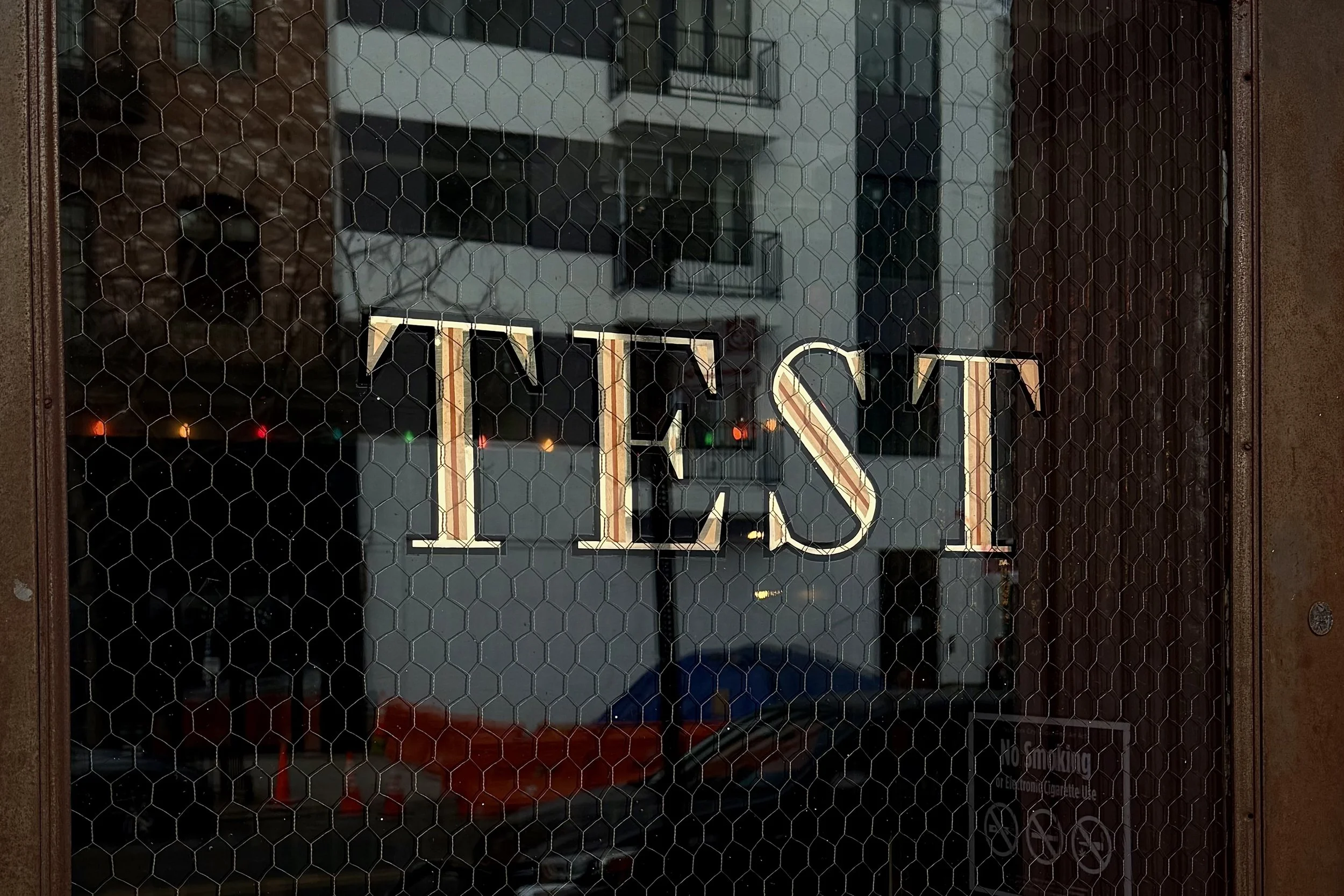 Boston gild style logo lettering with rose gold leaf and a copper mica inline