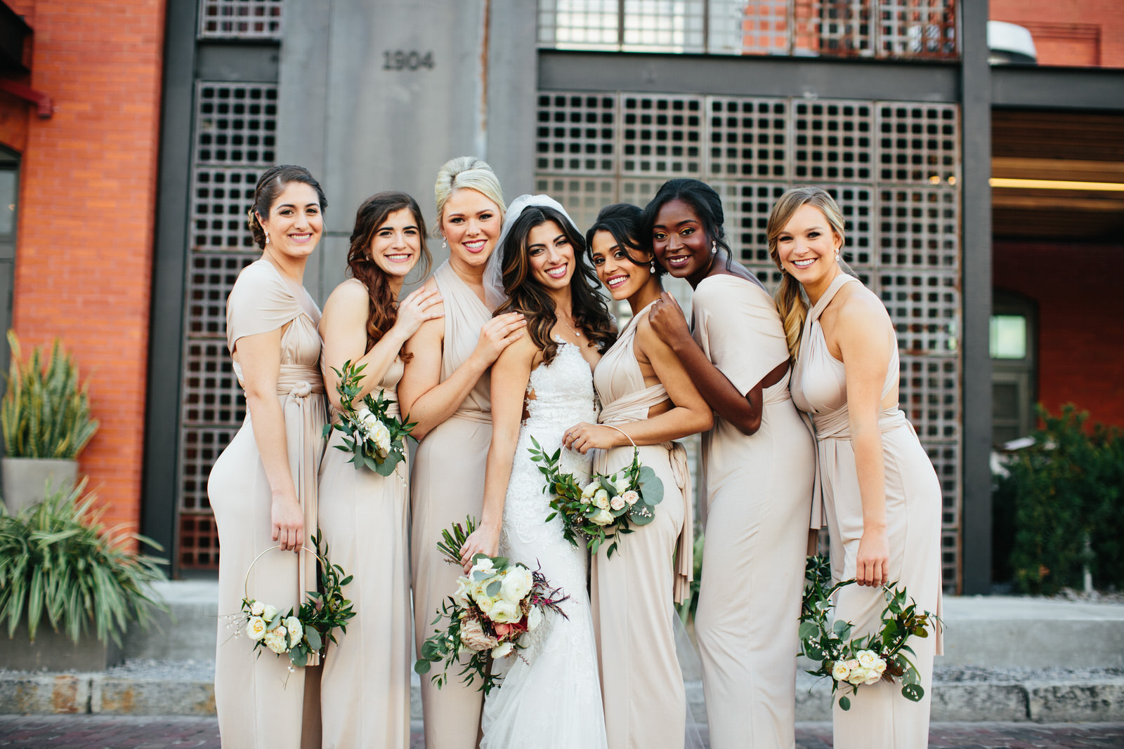 Bridesmaids Together in front of Armature Works Tampa Wedding