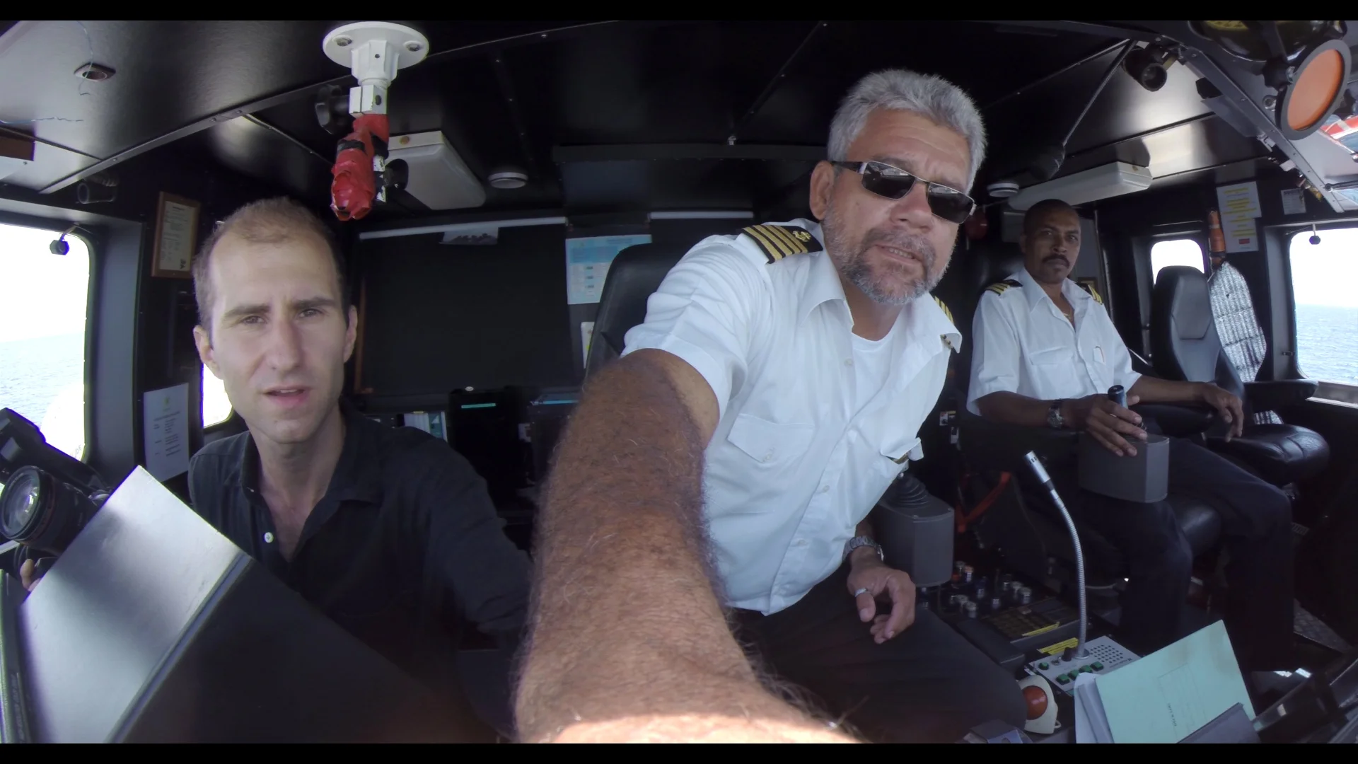The Captain adjusting my GoPro for me.