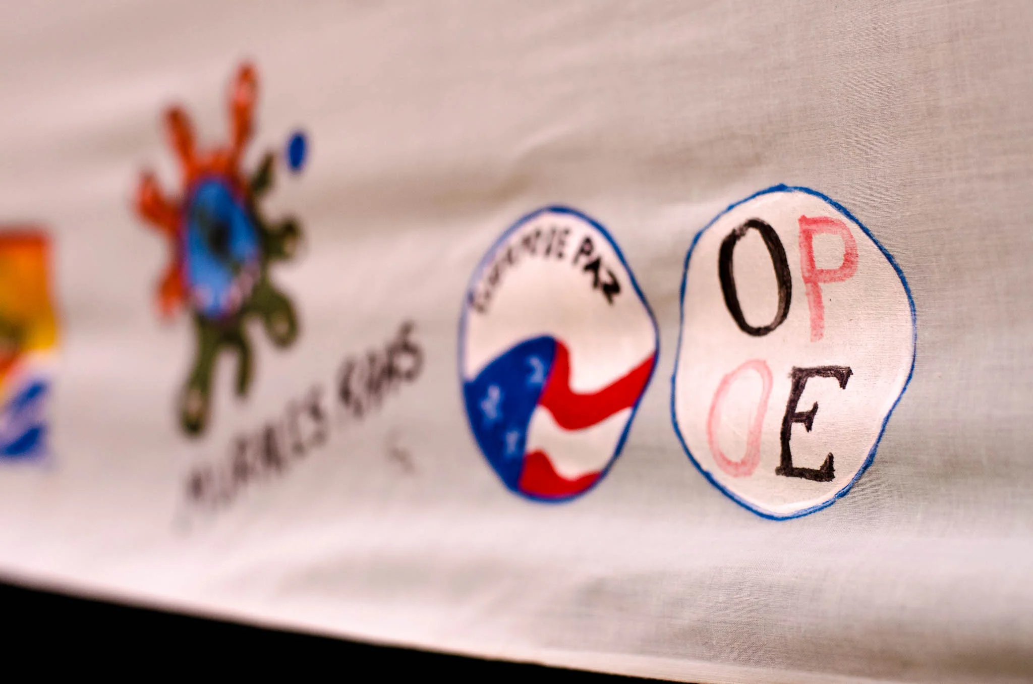 The event banner made by a local artist. - photo, Tom Miller