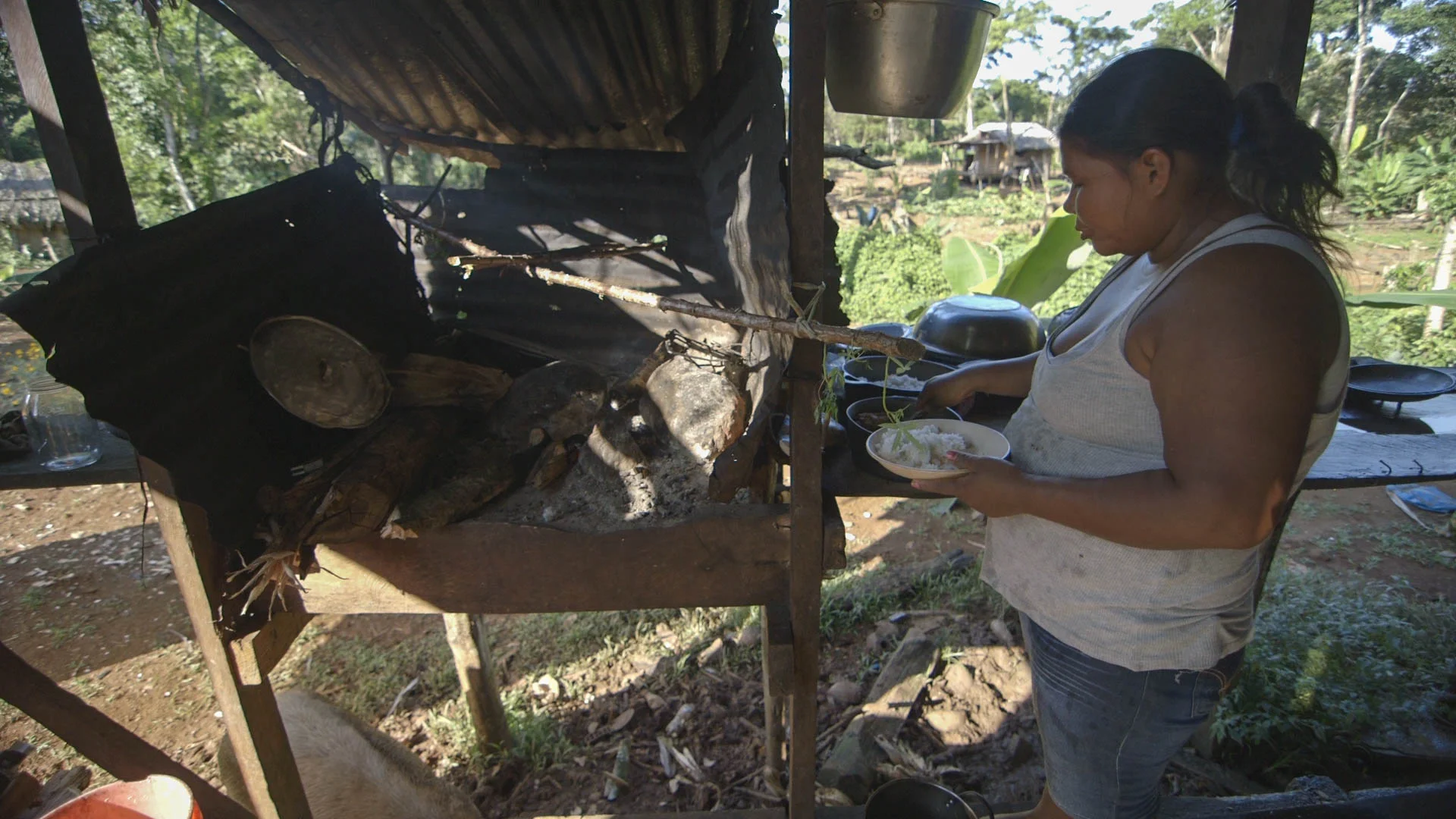Lena, cooking dinner in her kitchen - photo, Tom Miller