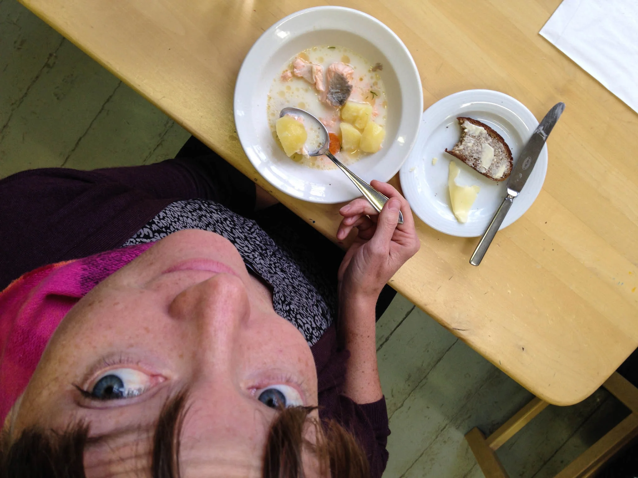 Nuin-Tara enjoying the fish stew - still, Tom Miller