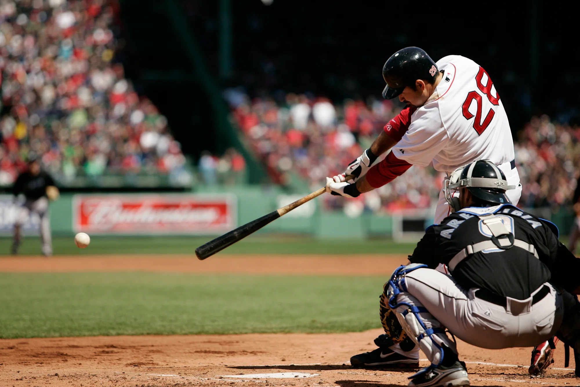 Boston Red Sox Adrian Gonzalez connects for a single in the first inning against the Toronto Blue Jays at Fenway Park in Boston on April 17, 2011. 