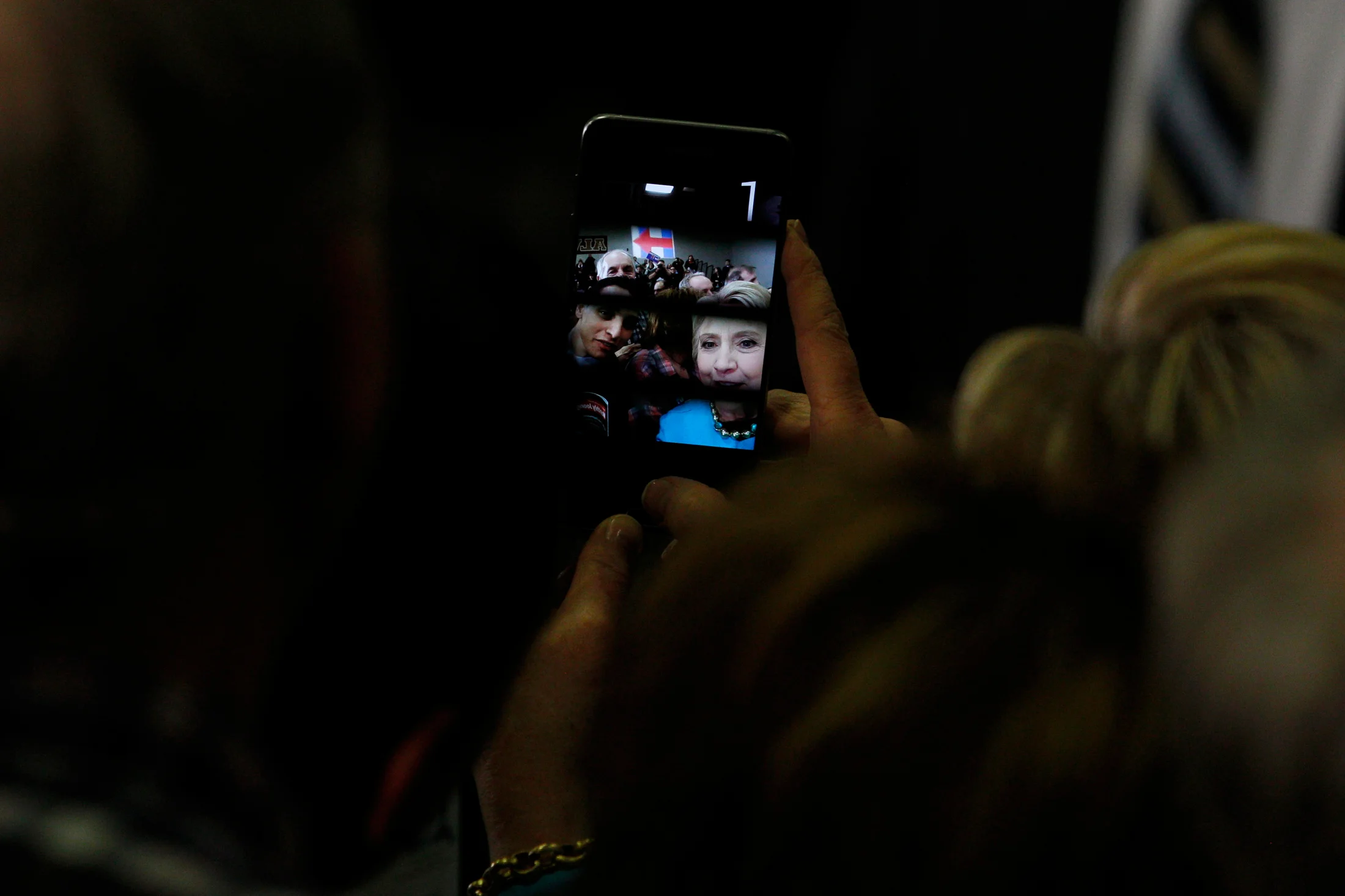 Democratic presidential candidate Hillary Clinton, poses for a photo with some fans after speaking at a Get Out The Vote rally at Alvirne High School in Hudson, New Hampshire on February 8, 2016. The event is Hillary Clinton's final pitch to potential voters before the New Hampshire Primary on Tuesday.