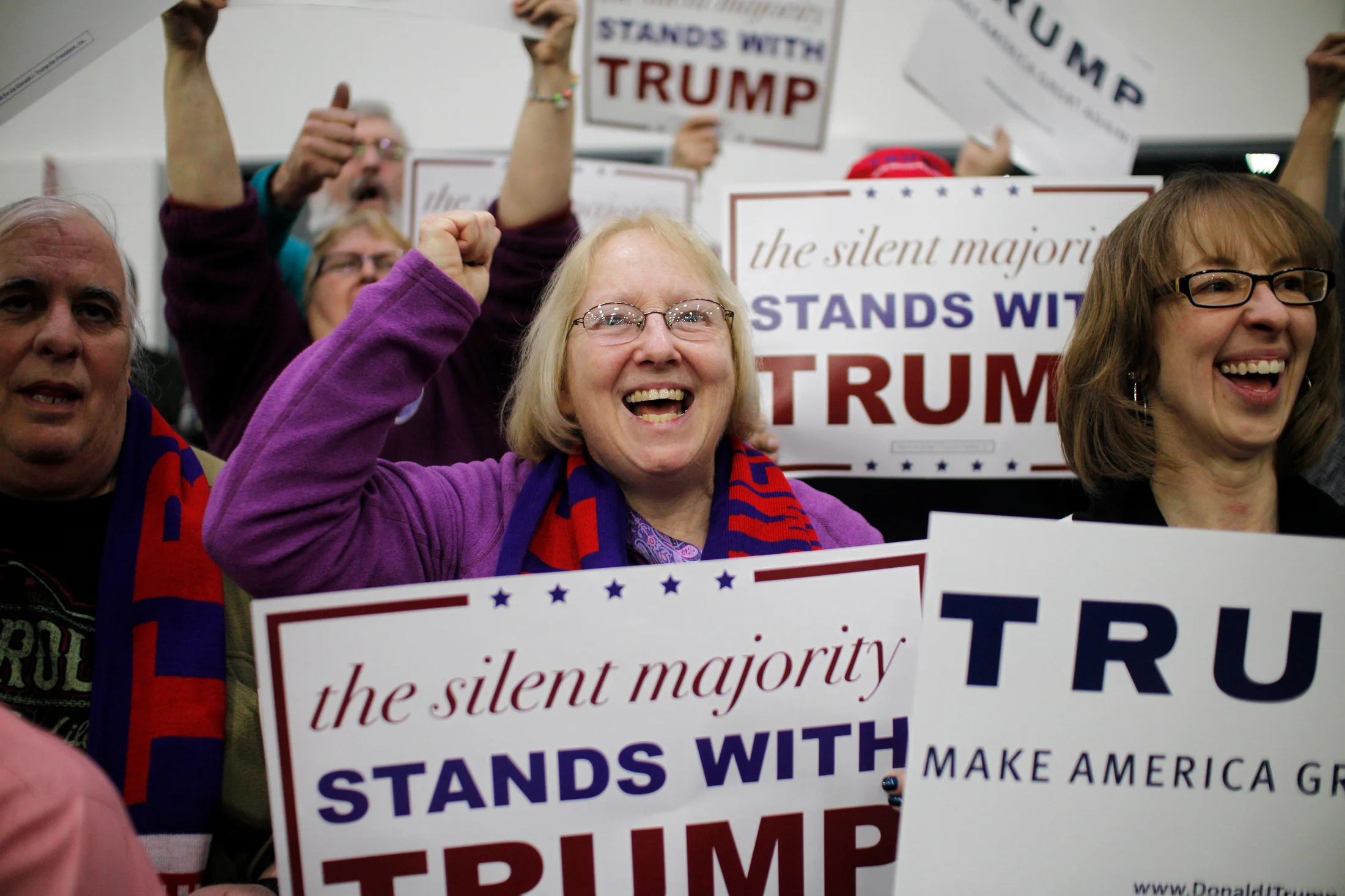 Supporters of Republican candidate for President Donald Trump cheer for the candidate before his arrival at a rally at Plymouth State University in Holderness, New Hampshire on February 7, 2016. New Hampshire will hold the first primary in the nation on February 9th.