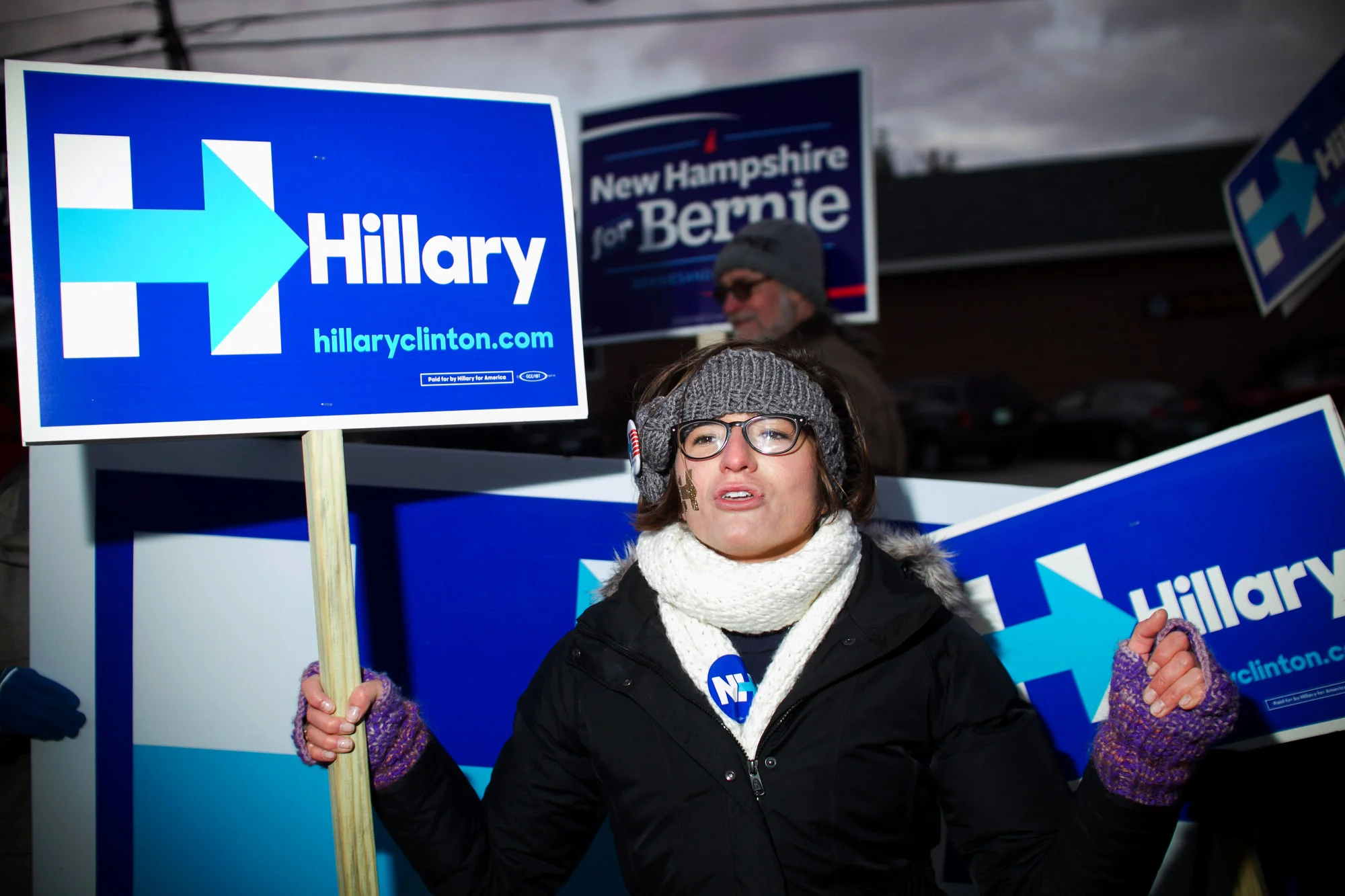 A woman chants to show her support for Democratic candidate for president Hillary Clinton, prior to a Democratic candidates debate at St. Anselm College in Manchester, New Hampshire on December 19, 2015. This will be the third Democratic debate.