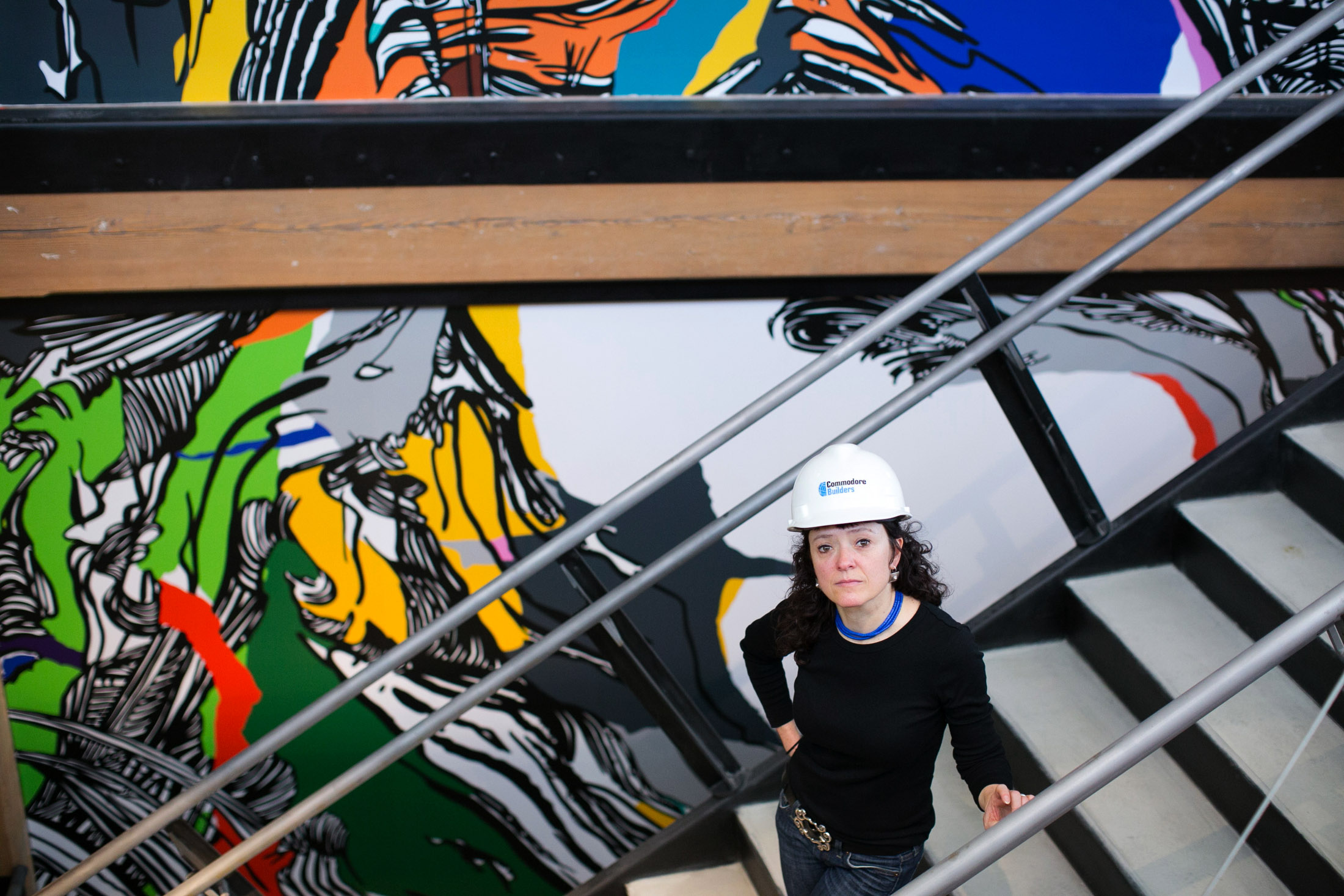  Mural artist Sophia Ainsley poses with her piece titled 'In Person, 574' which is being installed in the renovated 574 Boston Avenue in Medford, Massachusetts on Thursday, March 12, 2015. 