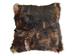 Add texture by way of a fur throw pillow - LuxDeco.com