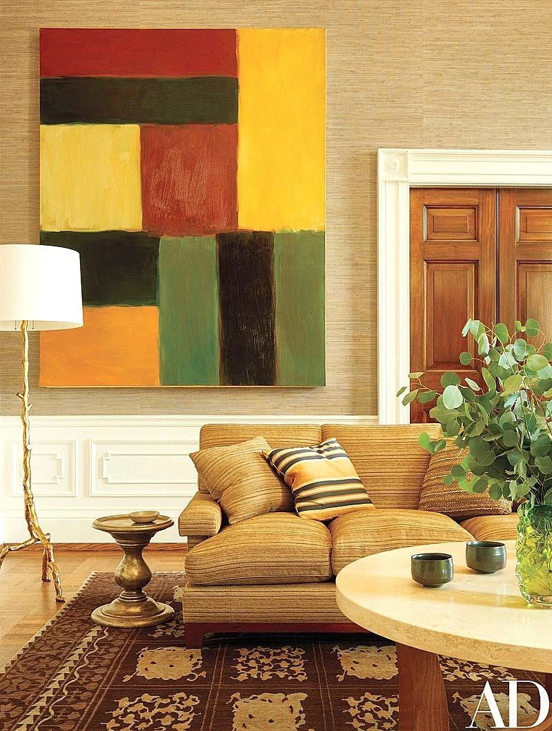 Love this painting by Sean Scully - the pops of color coordinate fabulously well with the fabrics and rug...the lamp and side table are like pieces of sculpture too