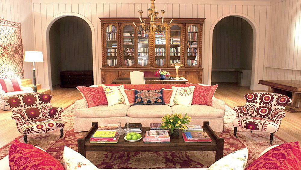 I'm totally digging the eclectic look of this selection of cushions, made with various antique textiles and Kathryn's own hand-made fabrics for her collection. As before, it comes down to scale, balance and proportion - here a total of 7 distinct patterns in this furniture grouping are all brought together by pairs of coordinating sofa cushions and a striking Suzani print used on the pair of side chairs.