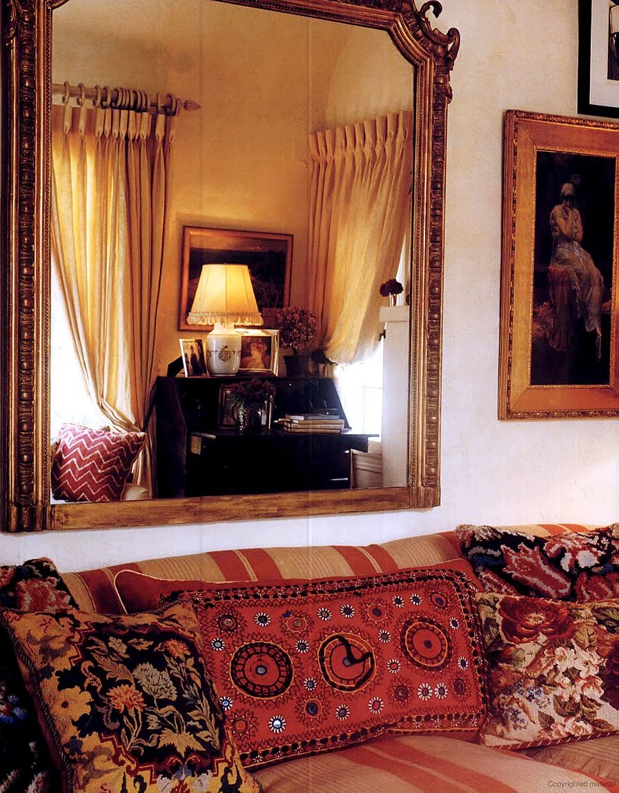 A selection of needlepoint textiles made into cushions