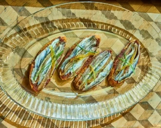 Toast with tomato jam, Boquerones and lemon oil - check out Bon Appétit for the recipe