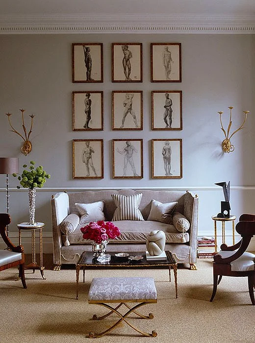 Photo by Simon Upton; interior by Alex Papachristidis You can't go wrong with the salon-style layout of classic nude drawings, using the same frame and matting for a consistent look
