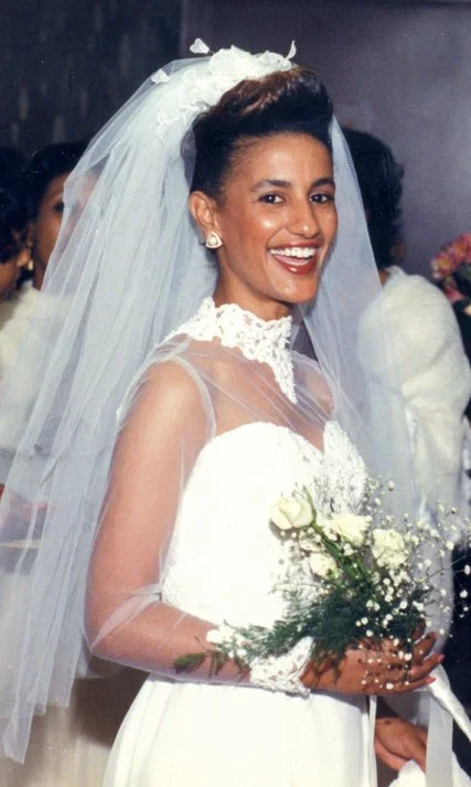 Amsale on her wedding day in 1985 is the beautiful bride in one of her namesake designs - credit Amsale