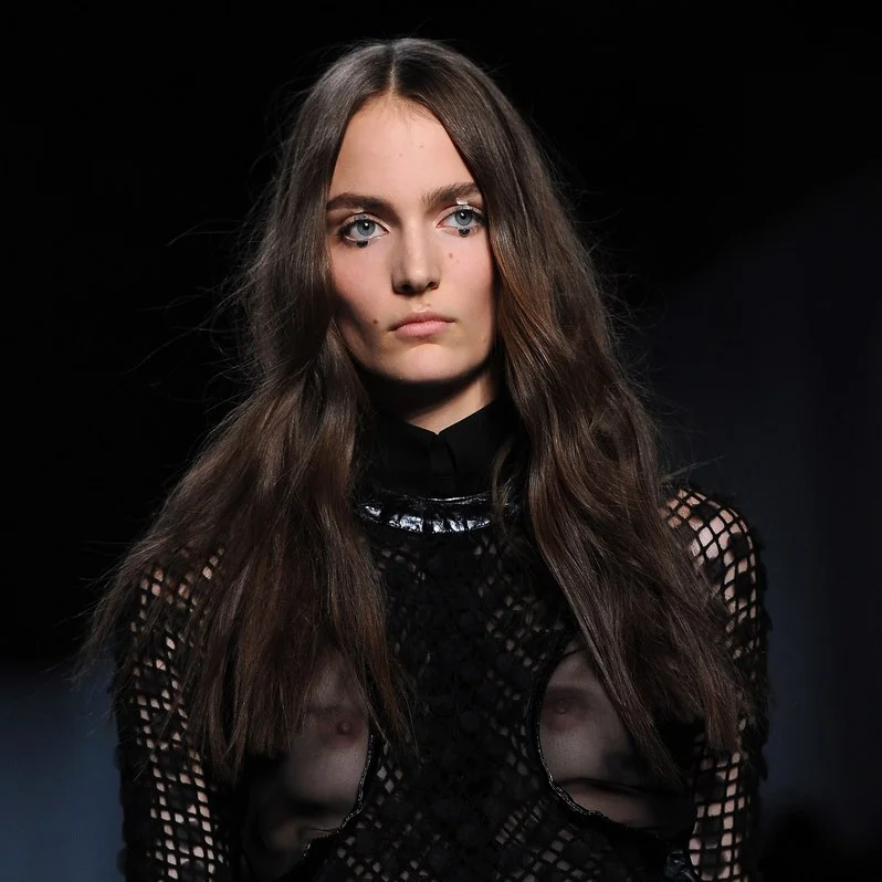 Givenchy Spring 2012 Proof that you don't need a lot to make a major statement. For Givenchy's water-inspired collection, McGrath cut a piece of sequins in half and glued it along the center of the top and bottom lashes. "It was hyper-minimal major-ness," McGrath says of the look. Allure Magazine: Photography - Pascal le Segretain