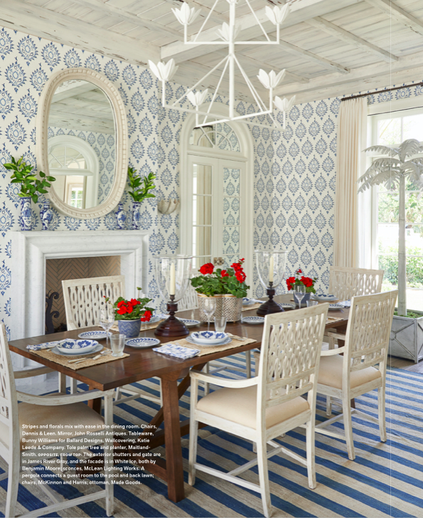 The oak dining table nicely grounds the room’s blue and white color scheme